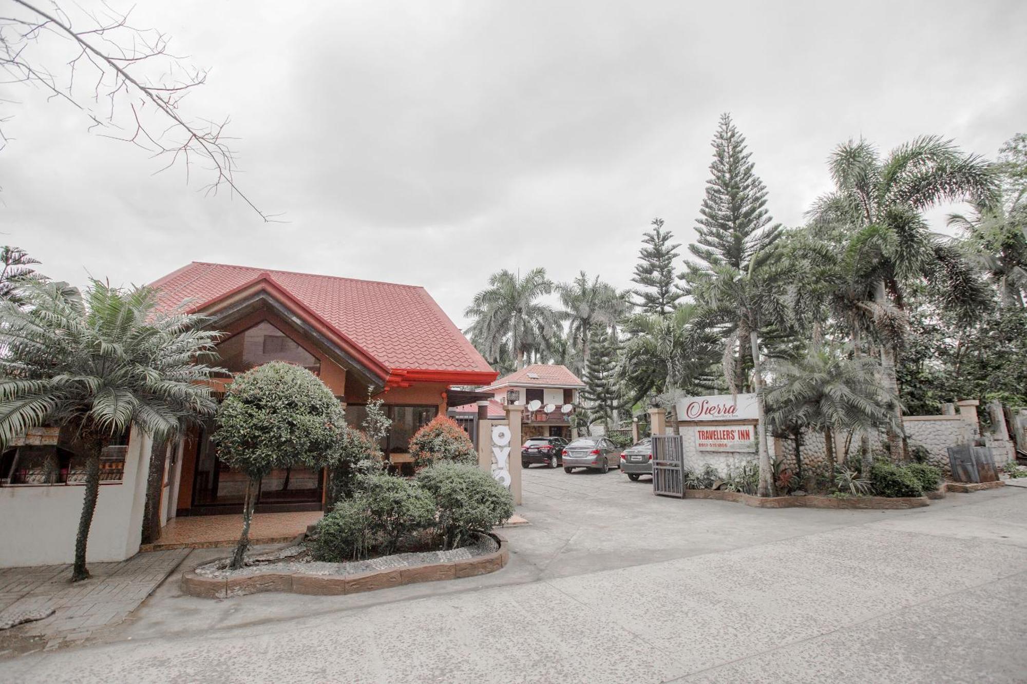Oyo 741 Sierra Travellers Inn Тагайтай Экстерьер фото